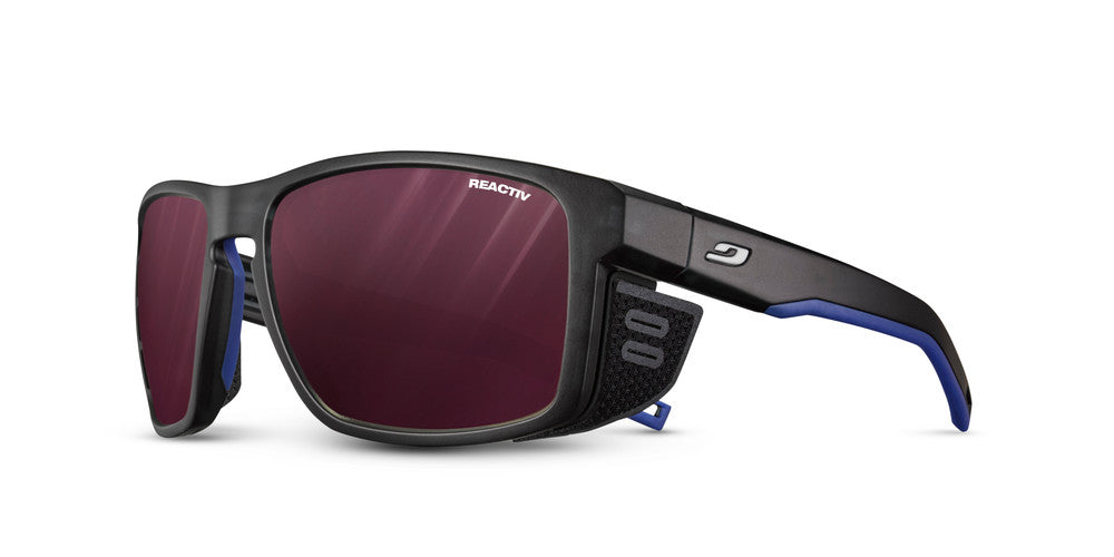 Julbo Shield Sportbrille – Schwarz / Blau / Weiß – REACTIV 0-4 High Contrast – Frontansicht