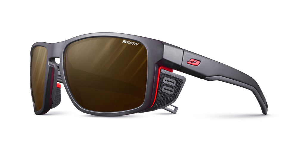 Julbo Shield Sportbrille – Schwarz / Orange – REACTIV 2-4 Polarized – Frontansicht